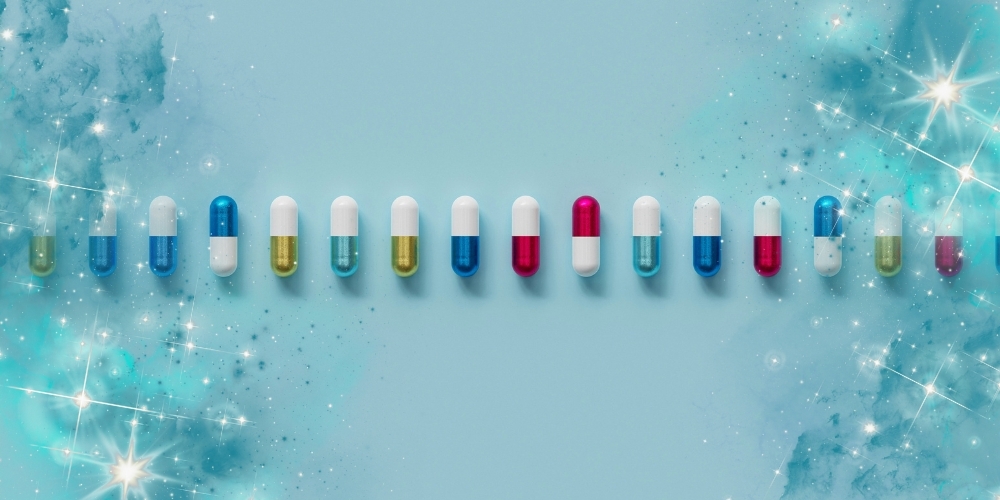 Row of pills on blue background